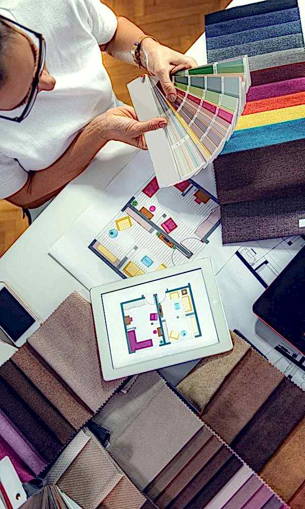 Architect, interior designer, looking at samples